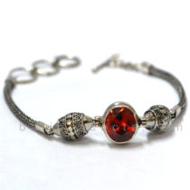 Gelang Mata Satu Merah Diapit 2 Drum